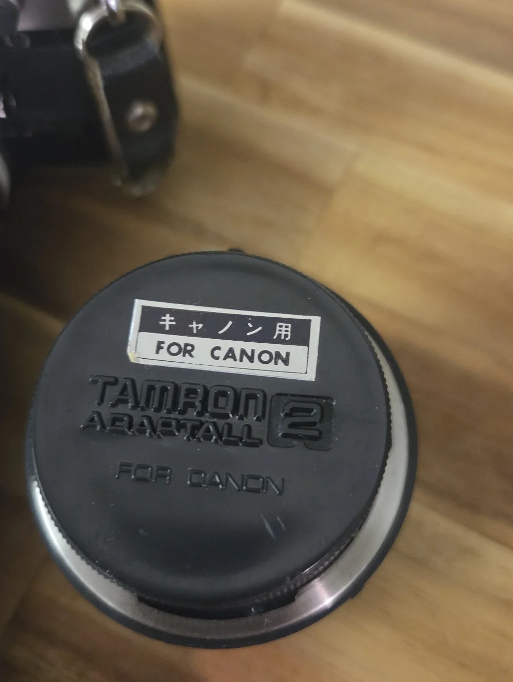 Canon Silver SLR Camera with Black Tamron 80-210mm Lens